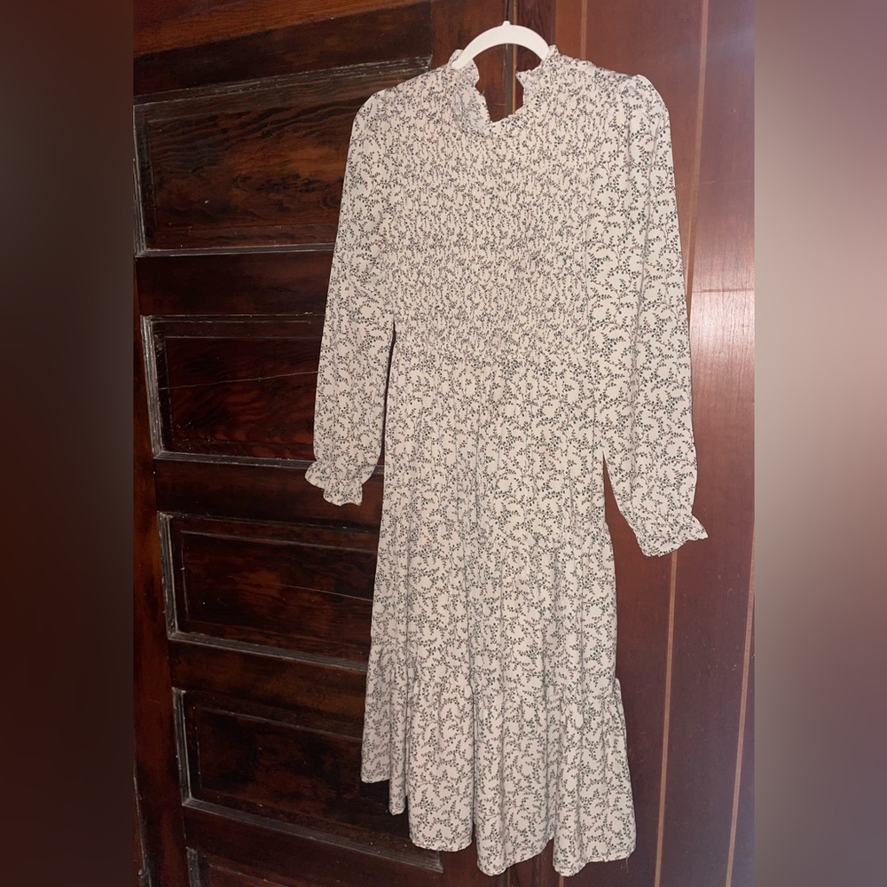 Beige floral midi dress.